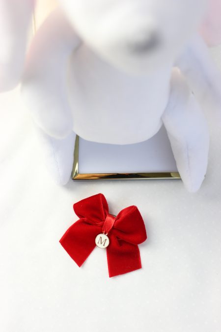 Czerwona kokardka do wózka