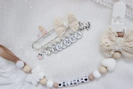 Zawieszka do smoczka beżowo- biała/ Klips plastikowy