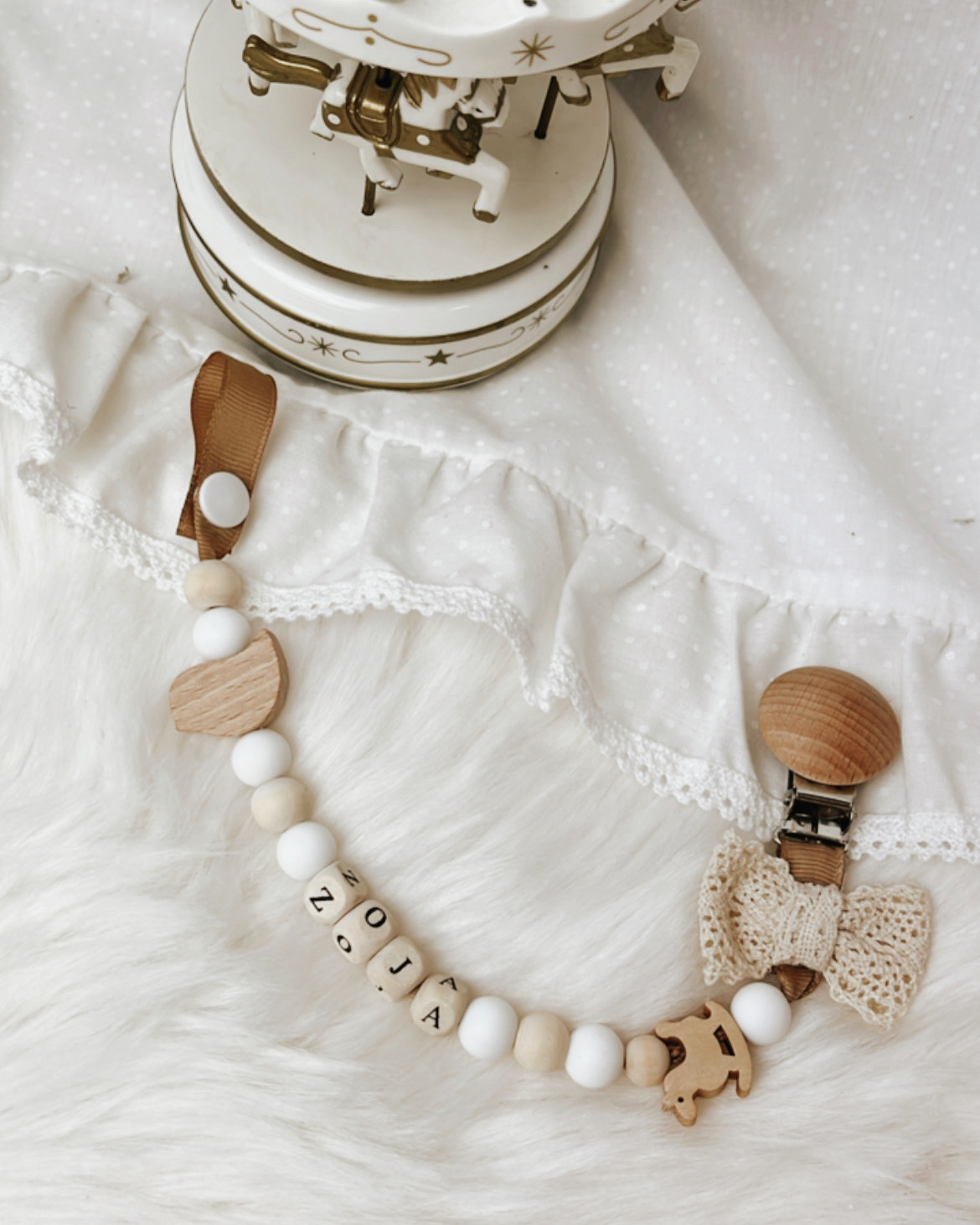 Zawieszka do smoczka drewniano, silikonowa z motywem ptaszka